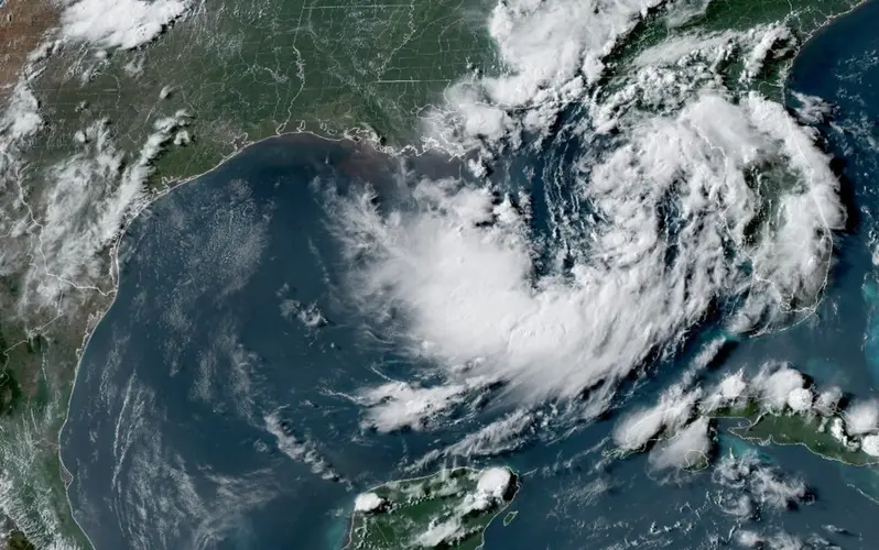 Tropical depression nearing US Gulf Coast set to become a tropical storm, forecasters say