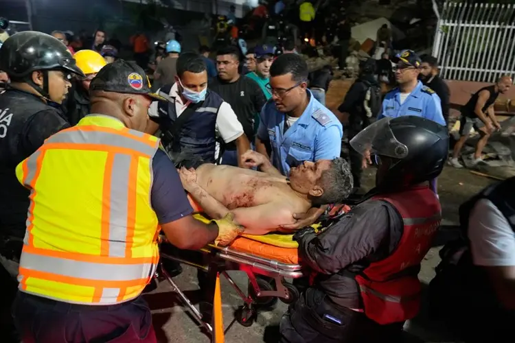 At least 164 dead and 971 injured after powerful quakes rock Venezuela, acting president says