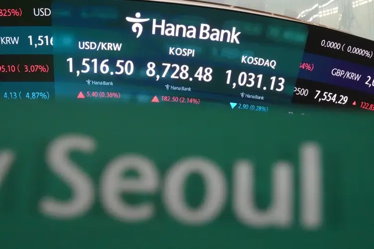 Asian shares are mostly higher and Japan's Nikkei tops 70,000 before BOJ rate hike