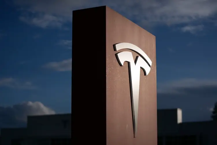 Earnings at Musk's car company fall as research spending cuts into profit from selling cars