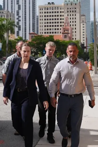 Teen accused of killing stepsister on Carnival Cruise taken into custody following adult charges