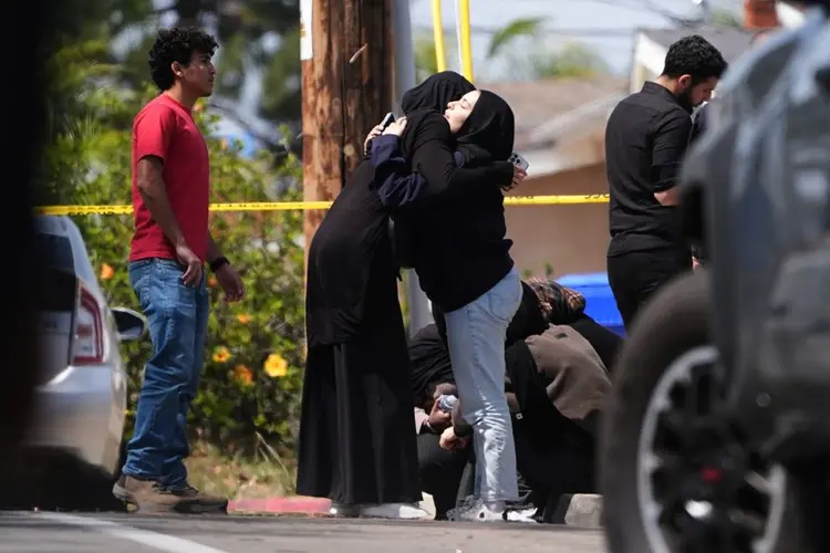 Parents of San Diego mosque gunman say a mental health facility failed to heed FBI warning