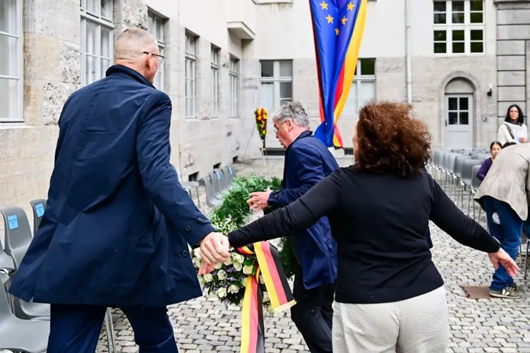 Descendant of Nazi opponent tries to remove far-right party's wreath at Hitler plot memorial event