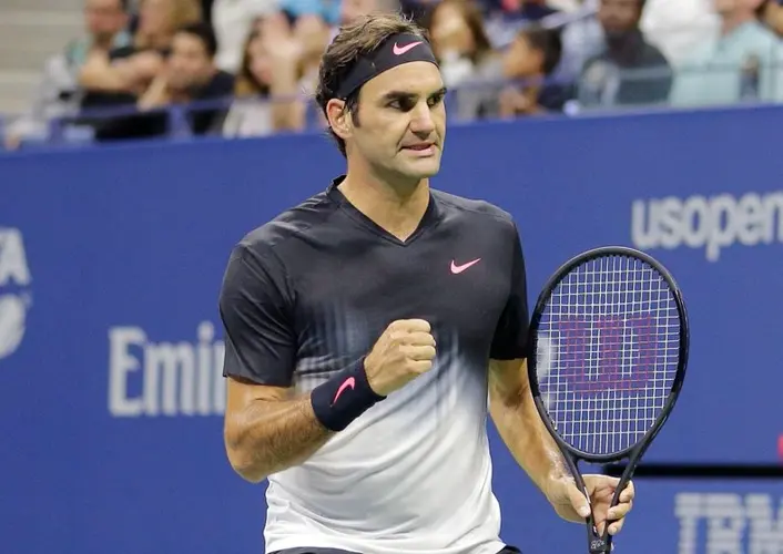 Roger Federer celebrated upon his return to the US Open for an exhibition against Andy Roddick