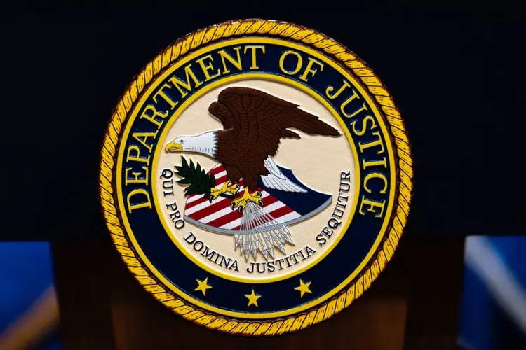 Federal prosecutor who was fired over years-old blog posts critical of Trump sues Justice Department