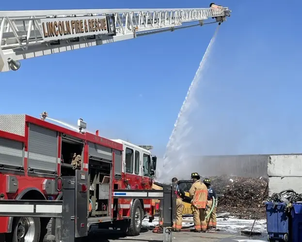 Firefighters battle blaze at recycling center