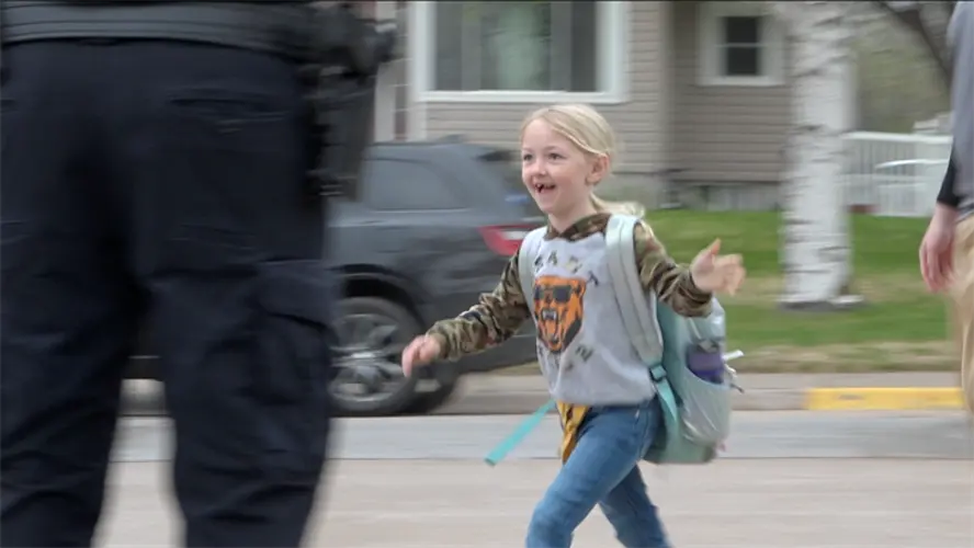 ‘Donuts with Grownups’ spreads smiles to Kearney students and officers