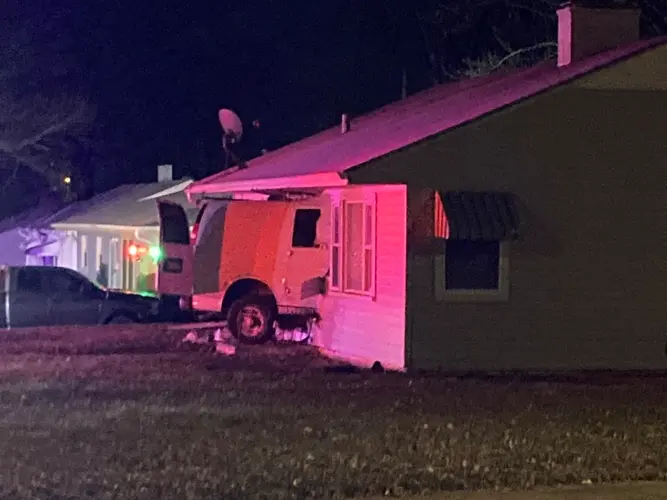 Van crashes into Omaha home