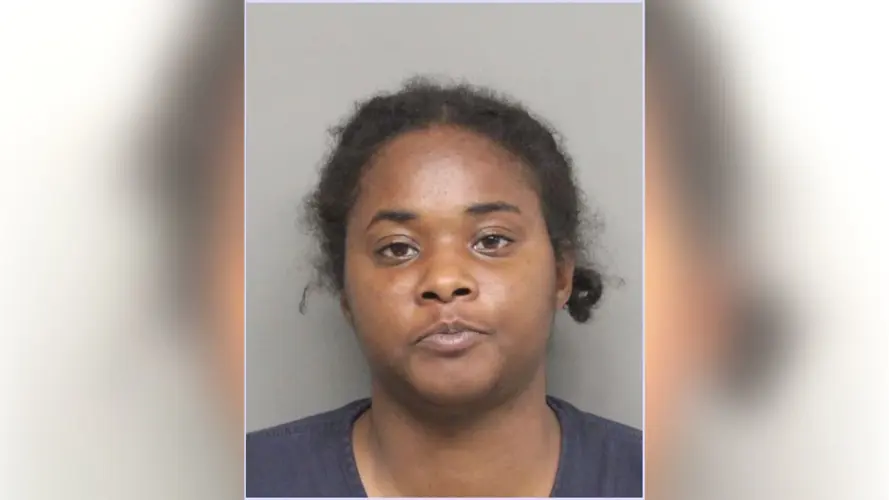 Woman bites officer's thigh during struggle