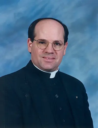Man arrested for homicide in connection to priest's death