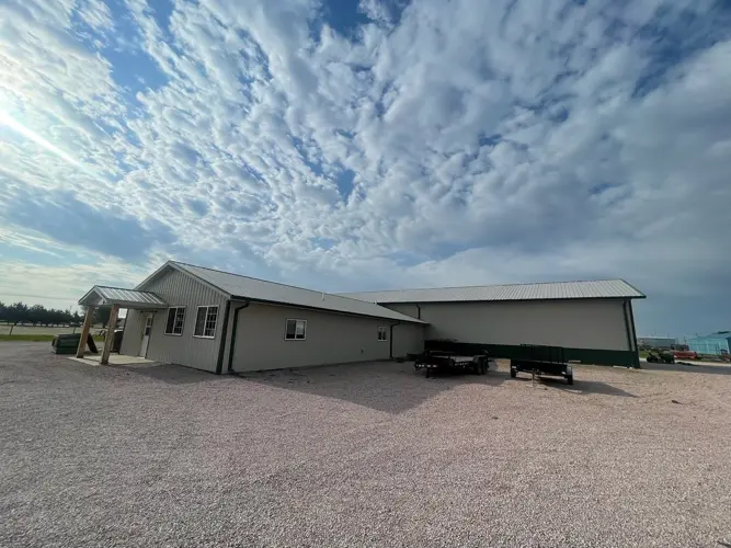 Valentine auction house building sells to growing construction company