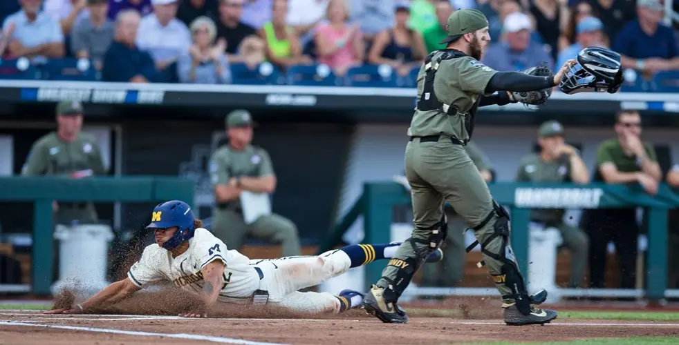 Homers and 'stellar' pitching propel Michigan to win first game of CWS championship series