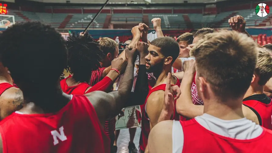 Cheatham, Burke Lift Huskers to Victory in Italy