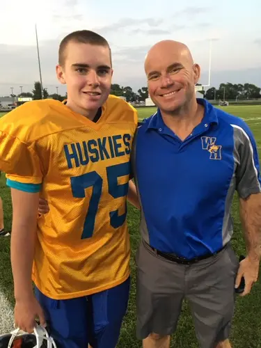 Six years after Nebraska TD, boy with cancer takes the field