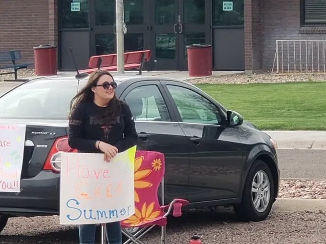 West Elementary students wave goodbye to teachers Wednesday