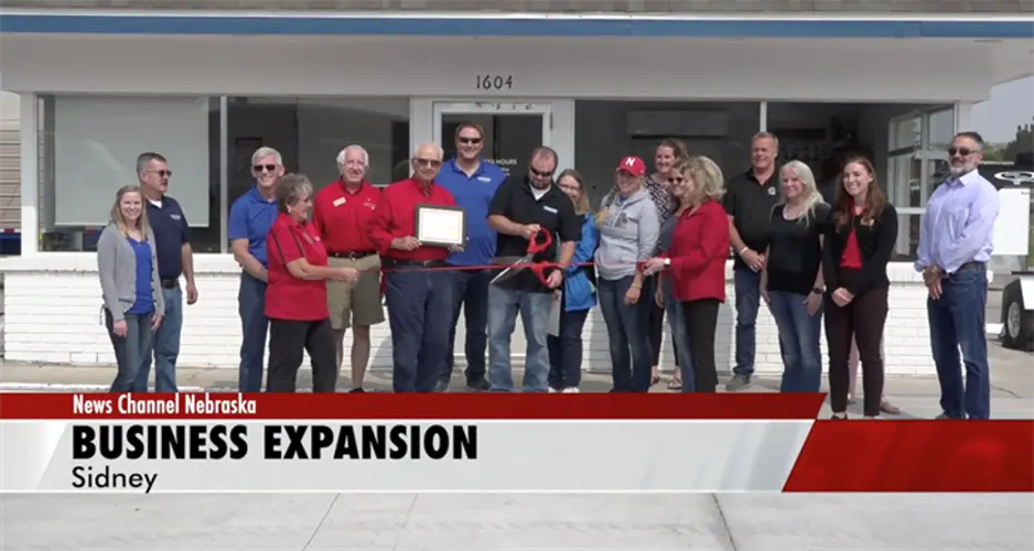 Adams Autos and Equipment cuts ribbon on new location