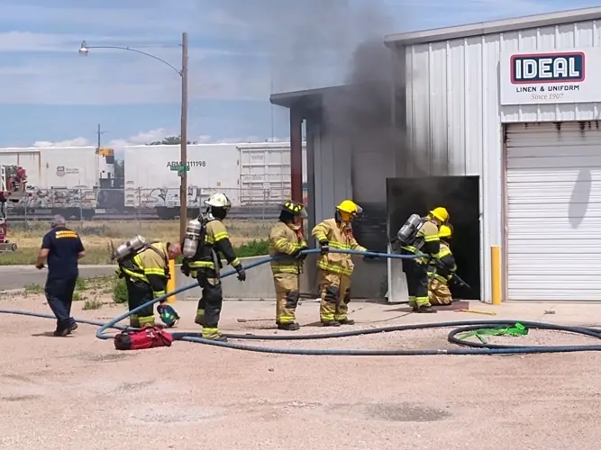 Fire fighters respond to emergency call at Ideal Linen and Uniform in Sidney