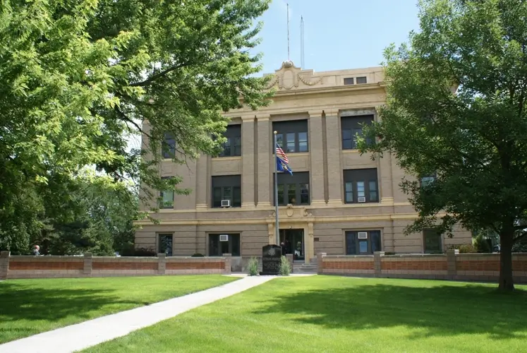 Greeley County commissioner fined for doing road work for the county