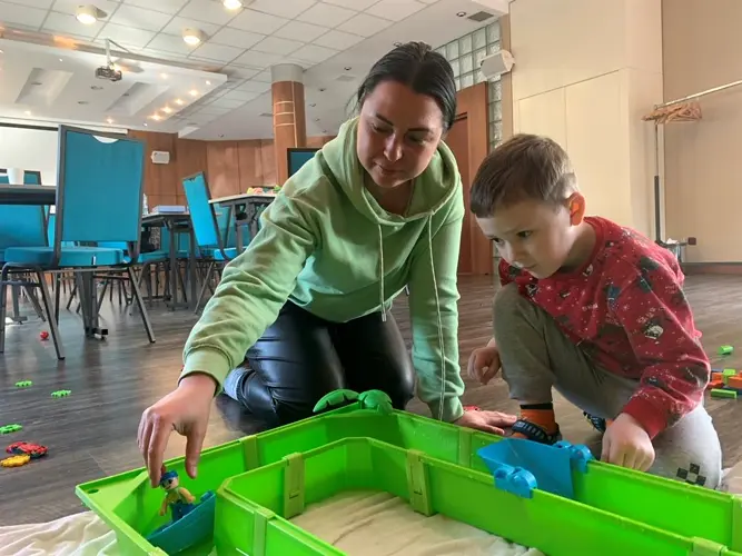Near Ukrainian border, Nebraskans offer play, comfort to child refugees