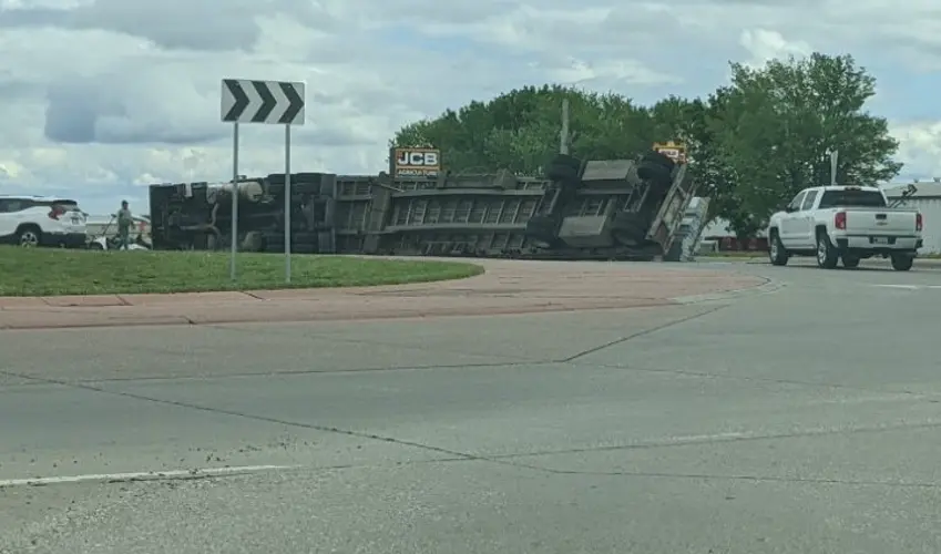 No injuries in semi rollover, significant damage to truck and load