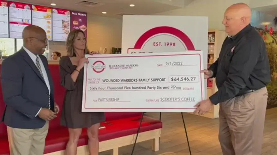 Scooter's Coffee donates check to Wounded Warriors Family Support
