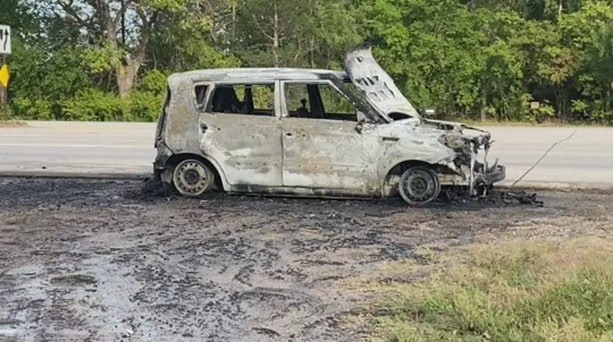 Occupants escape injury as car catches fire near Norfolk