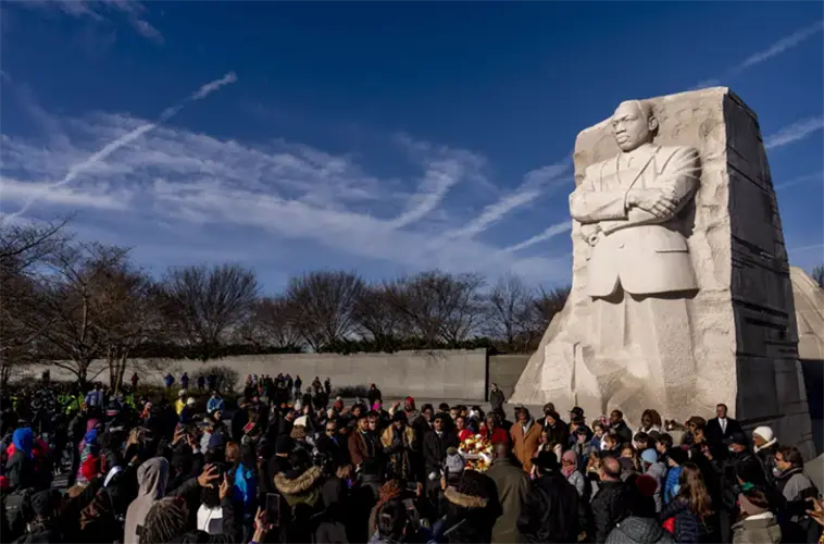 On King’s holiday, daughter calls for bold action over words