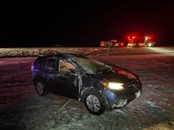 Roll over accident totals vehicle, occupants treated at scene