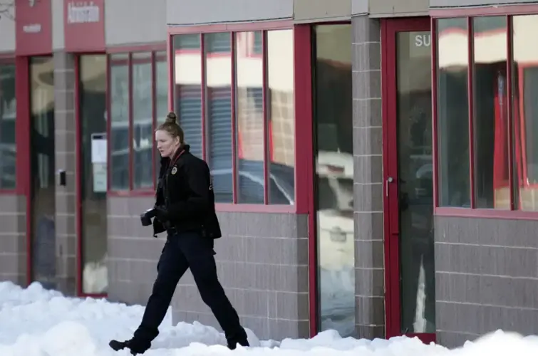 Police charge 2nd teen in Iowa school shooting that killed 2
