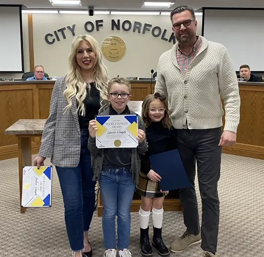 Wingate family honored by city for helping with student lunch debt