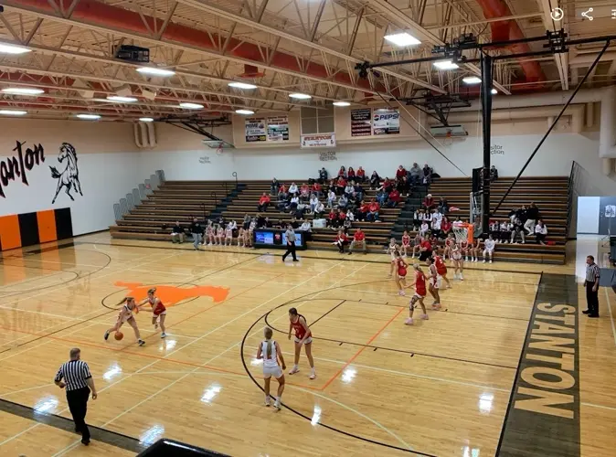 Stanton girls win a gritty battle, Norfolk Catholic boys roll
