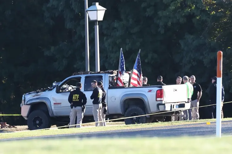 Police remain on scene at burned out Michigan church after shooting and fire leave 4 dead, 8 wounded
