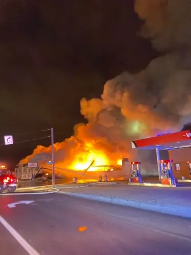 Fire fighters respond to large blaze at Westco Tire in Alliance