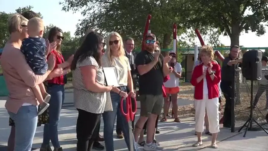 Sidney kids, adults celebrate new playground in Legion Park