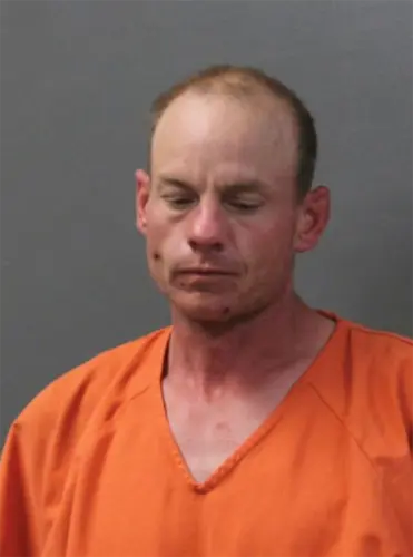 Man avoids arrest and drives through school barricades