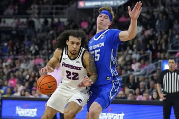 Carter leads No. 24 Providence past No. 18 Creighton in 2 OT