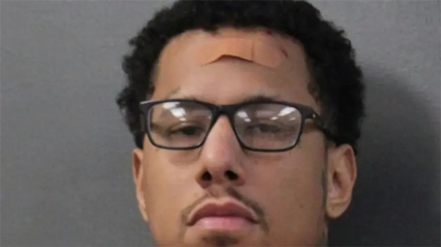 Police arrest man for pointing a firearm at motorists