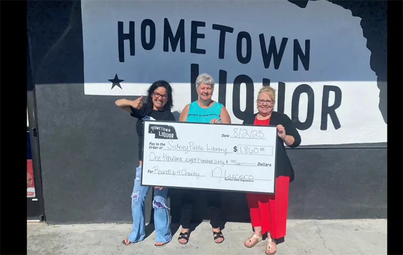 Hometown Liquor supports Sidney Public Library