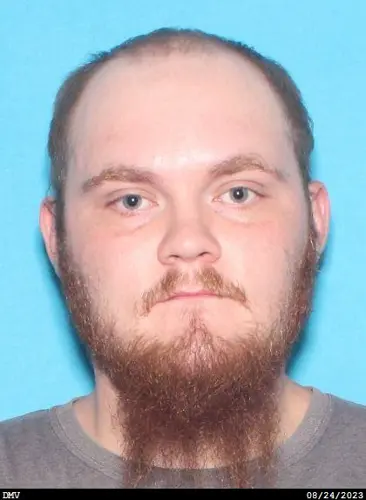 Robinson advised of charges in vehicle theft, assault