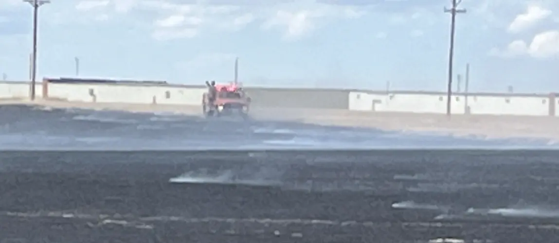 Firefighters respond to grass fire