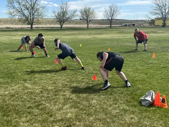 Kimball coaches prepare for football camps in July