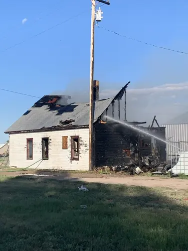 Severe Bushnell residential fire; owner arrested