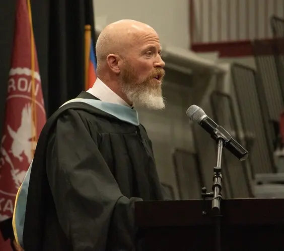 Commencement speaker shares stories, encourages graduates to share theirs