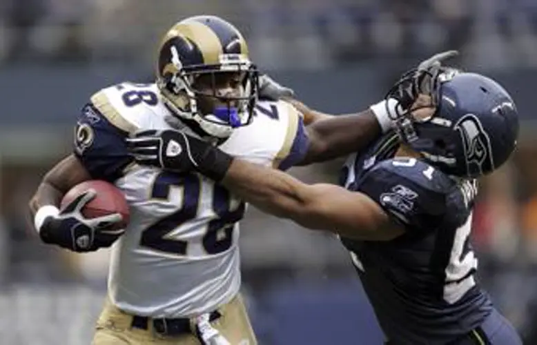 Colorado sports notes: Deion Sanders brings in Hall of Famer Marshall Faulk to coach the running backs at Colorado