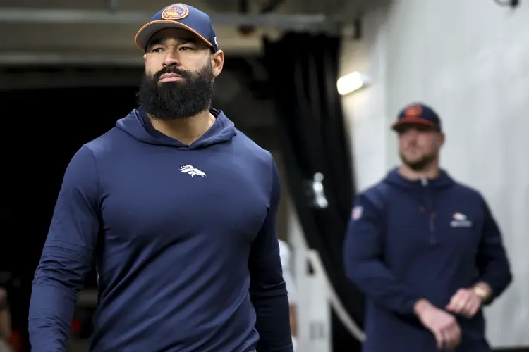 Broncos assistant coach Michael Wilhoite arrested after being accused of punching a police officer