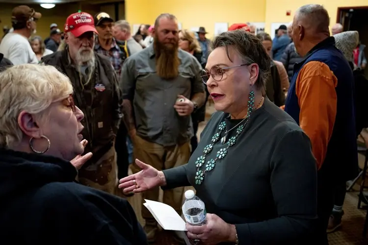 Angst pervades a pair of Republican town halls — one in Trump country, the other in a swing state