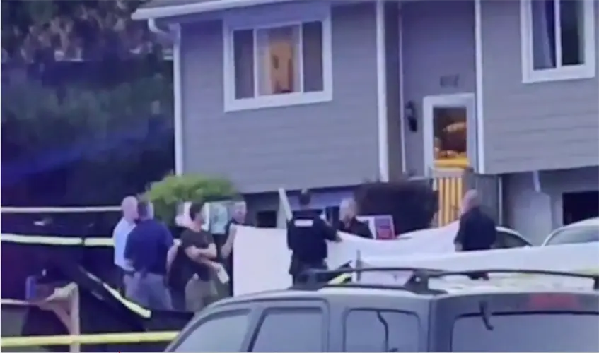 Officials: Car left running in garage led to 3 Omaha deaths