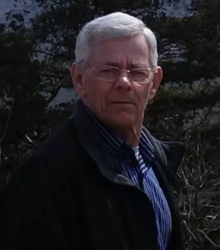 Gilbert M. Earl, 74, Nebr. City