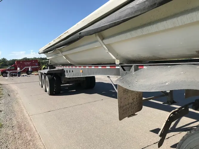 LifeNet called after motorcycle hits trailer