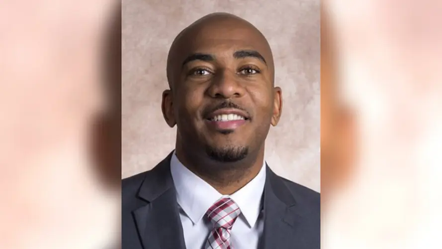 UNL women's basketball associate head coach suspended